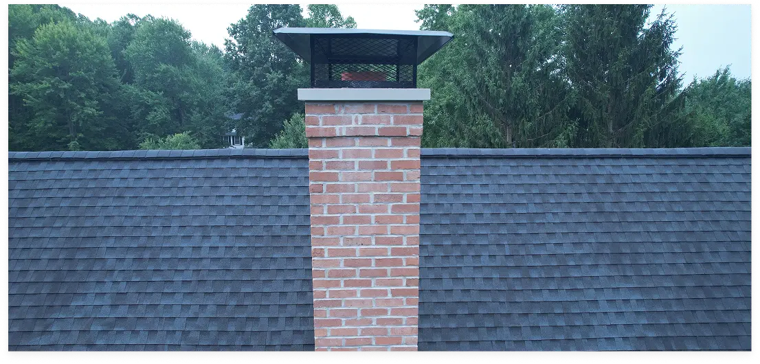 Masonry workers restoring brickwork on a Greater Cleveland home.